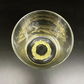2 Teelichter mit Goldornament im Boden